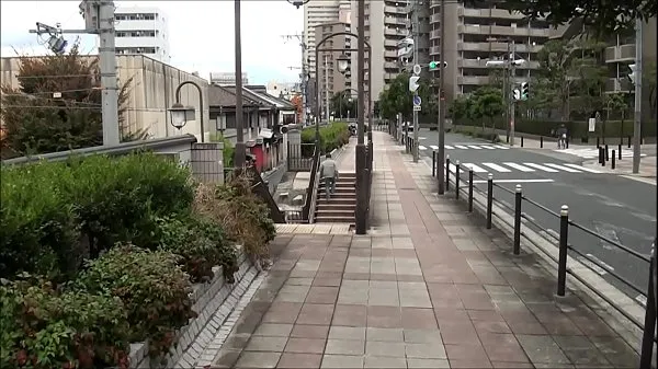 Frisches Rosafarbener heller Bezirk in Osaka JapanDrive Tube