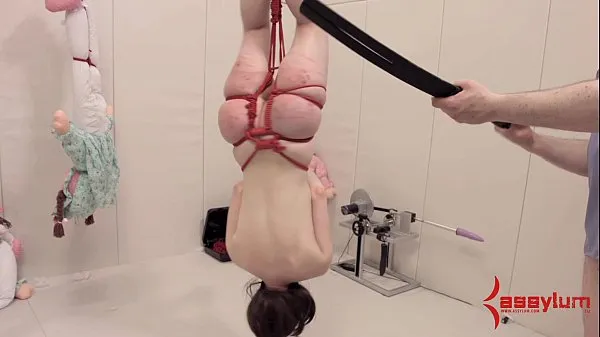 Verse Anal masochist hung upside down and a drive-tube